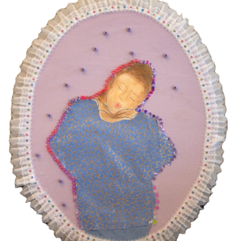 Self-portrait of a young girl wearing blue and posing with a heart using her hands