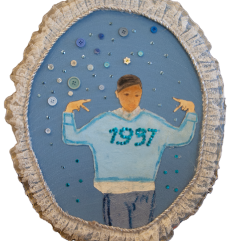 Self-portrait of young girl wearing a blue sweater with 1997 on it