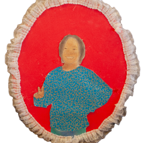 Self-portrait of young girl posing with a peace sign
