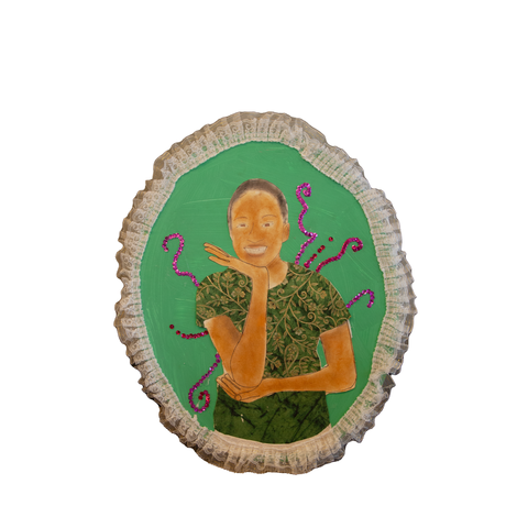 Self-portrait of young girl wearing a green floral outfit
