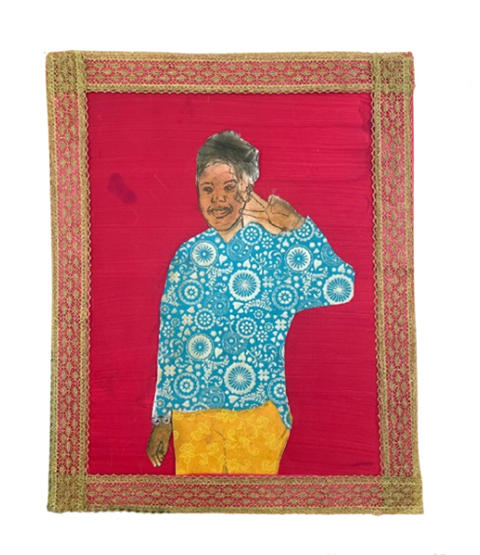 Self portrait of a young girl wearing a bracelet and making a peace sign with one hand.